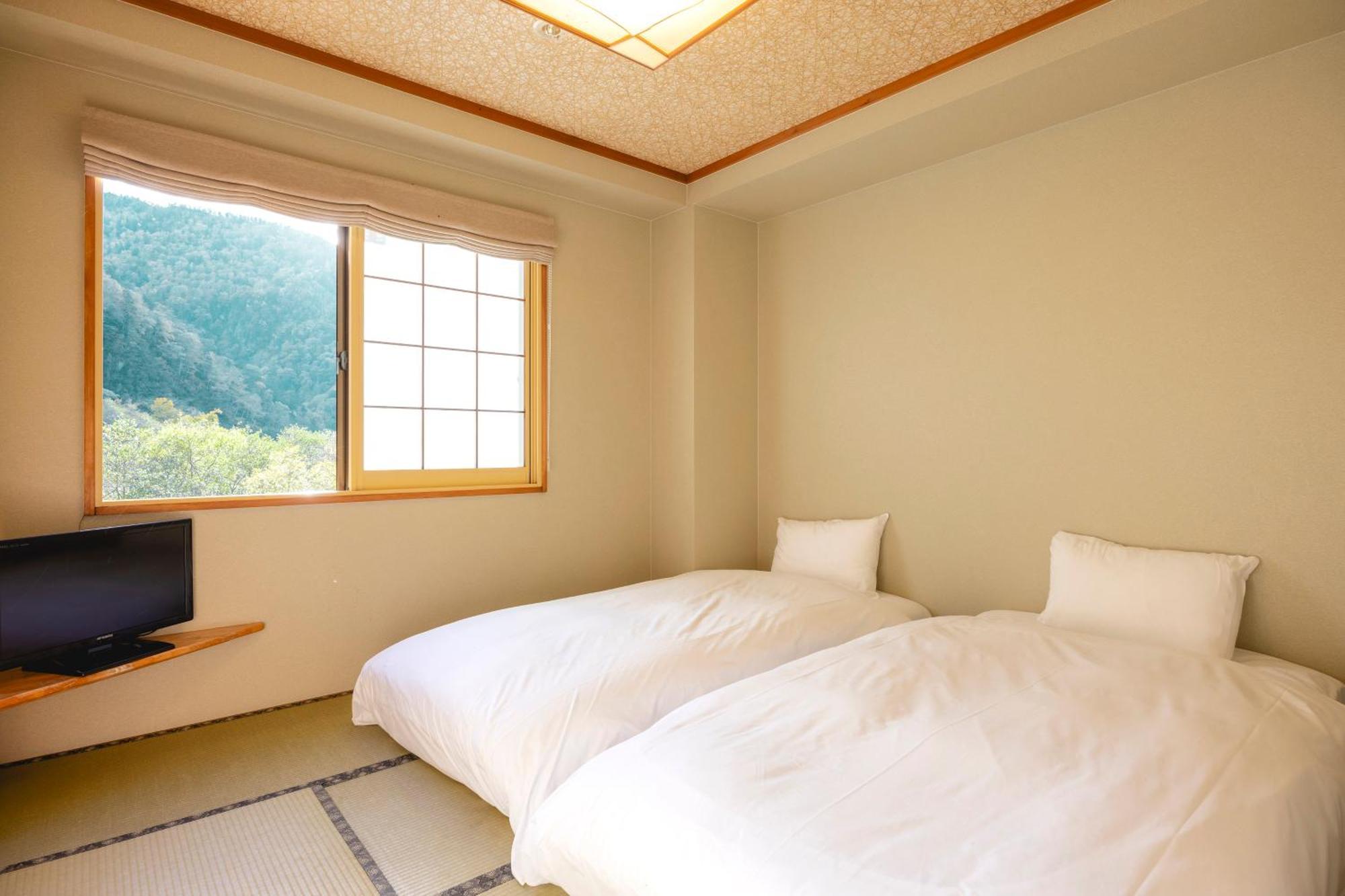 Shikishimaso Hotel Higashikawa Buitenkant foto